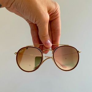 Rose gold like new Ray Bans.